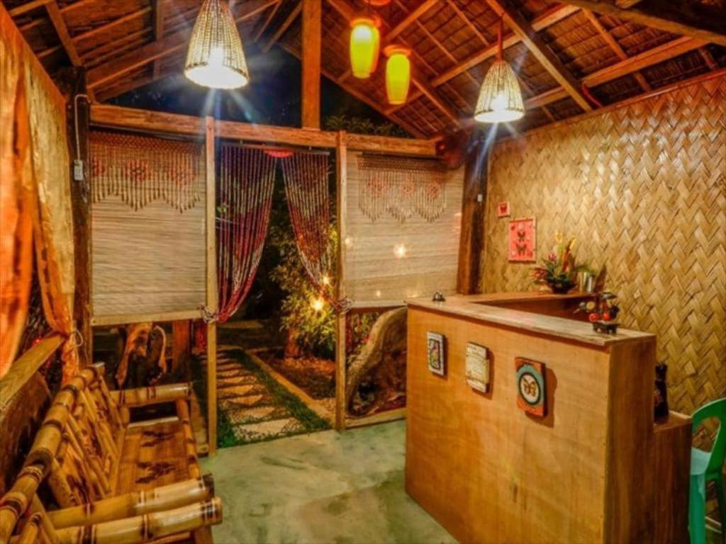 Oyo 622 Butterfly Totem Guesthouse Puerto Princesa Exterior photo